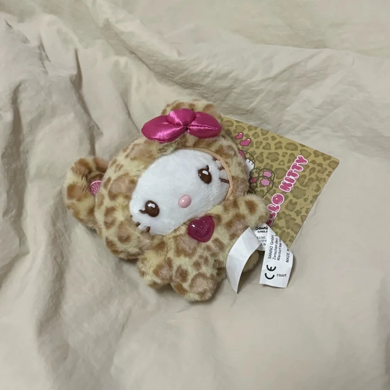 Simpatico caffè latte stampa leopardata Kt gatto peluche fiocco bambola ciondolo zaino carino peluche portachiavi ciondolo regalo di compleanno per ragazze