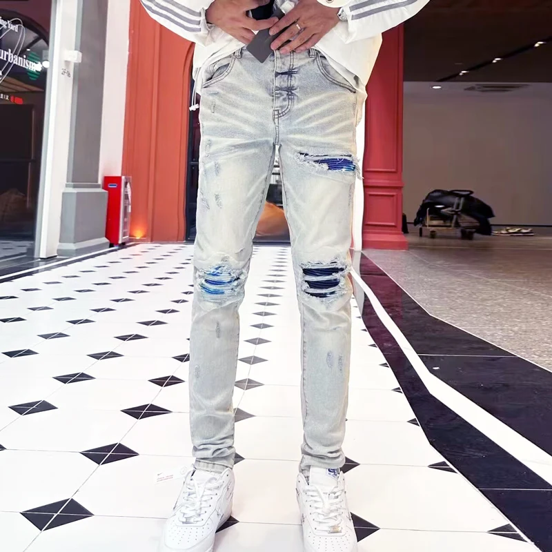 Y2k designer's fashionable new men's jeans, washed with nostalgia, perforated patch, elastic band, slim fit, light blue jeans