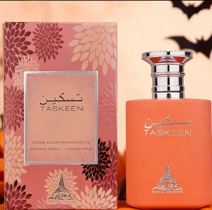 رذاذ عطر Taskeen 3.38oz جسم زجاجة برتقالية بلوري، غطاء زجاجة فضي، جو بسيط، عطر نسائي يدوم طويلاً