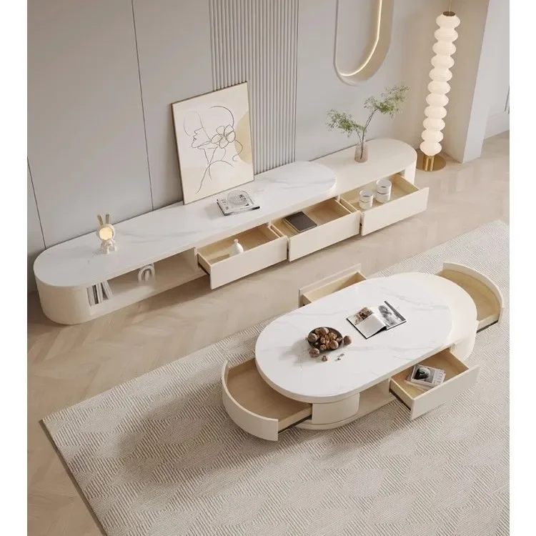 

Комплект мебели для гостиной: журнальный столик и тумба под ТВ из каменной плиты, в стиле лёгкой роскоши, кремового цвета, с выдвижной столешницей, современный, простой, для небольшой квартиры, овальной формы.