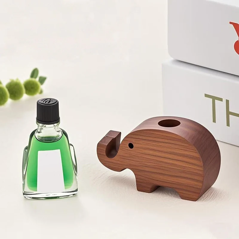 環境に優しい木製アロマディフューザー 香りが広がる ライオン/ゾウの形をした木製ディフューザー 爽やかな空気 長持ち