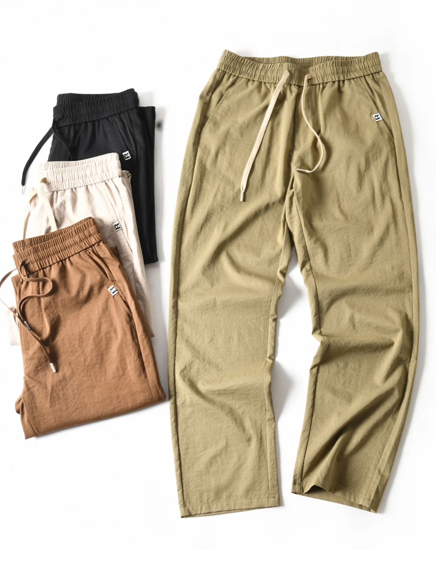 

New American Sle Lightweight Qui Dry Elastic Breathable Color Loose Straight Casual Pants Men's Spring Summer Sport...