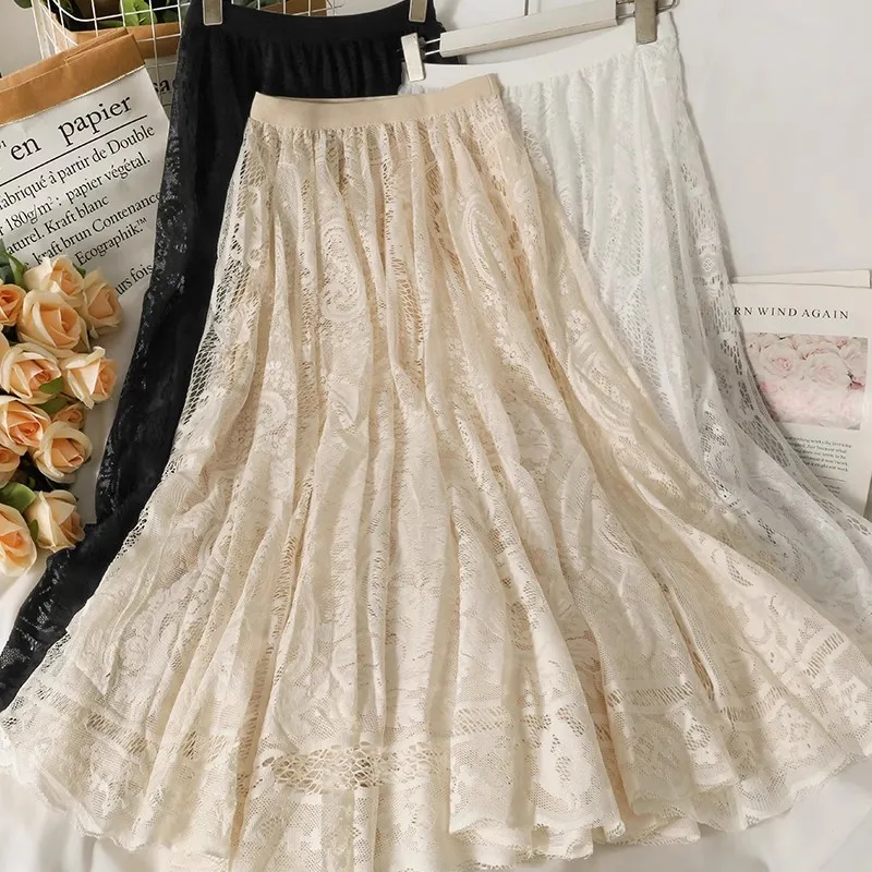 Primavera verão doce crochê rendas saias femininas elásticas de cintura alta oco para fora saia de malha feminina a linha bainha grande saia longa saia