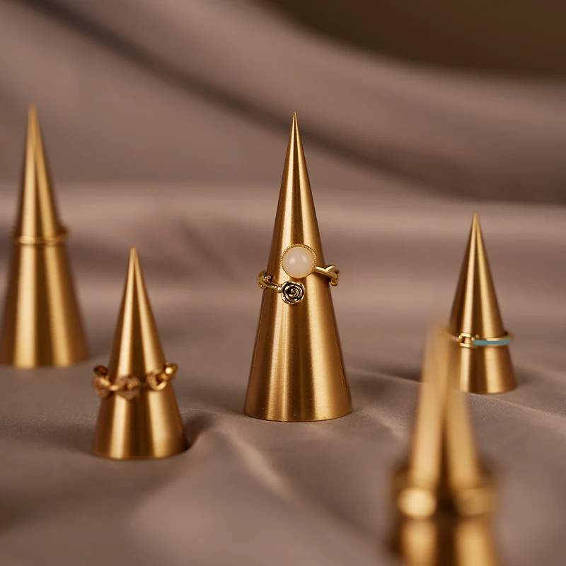 

All-metal conical ring stand, jewelry display prop, decorative piece, jewelry showcase stand for jewelry store display shooting.