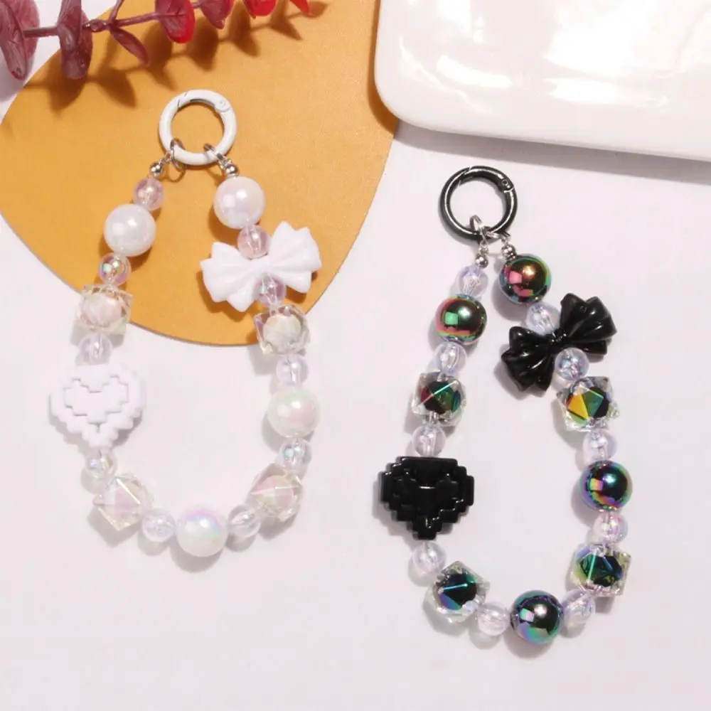 Cinghie per cellulare con fiocco anti-smarrimento Cordino in acrilico Cinturino da polso con perline Bracciale stile coreano Portachiavi Borsa a catena Accessori per borse