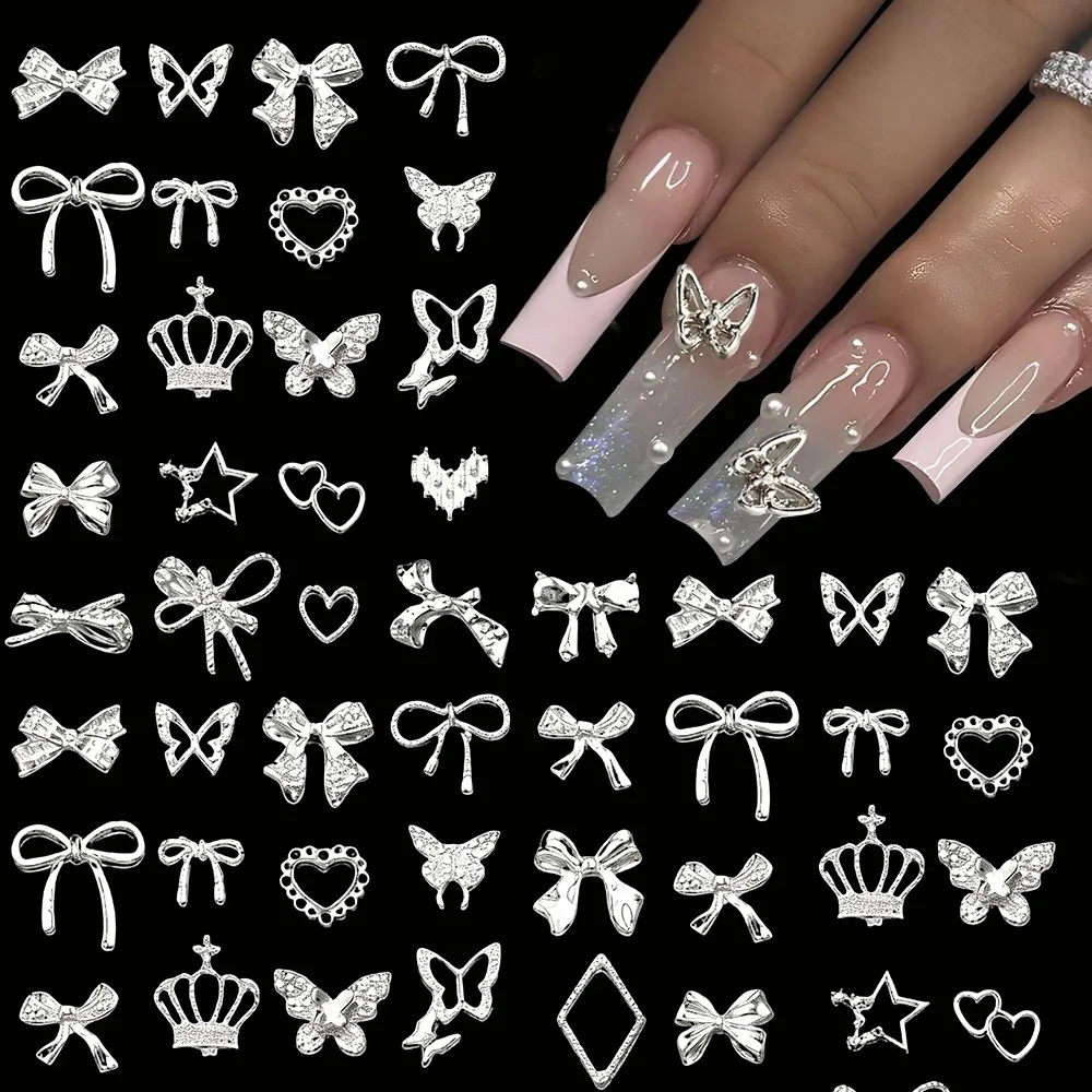 ชาร์มตกแต่งเล็บรูปโบว์ผีเสื้อโลหะผสมสีเงินสีทอง 50 ชิ้น สไตล์ Y2k น่ารัก รูปโบว์ผูกผม รูปหัวใจ ของตกแต่งเล็บโลหะ โบว์ผูกผมแบบผสม อุปกรณ์ทำเล็บ