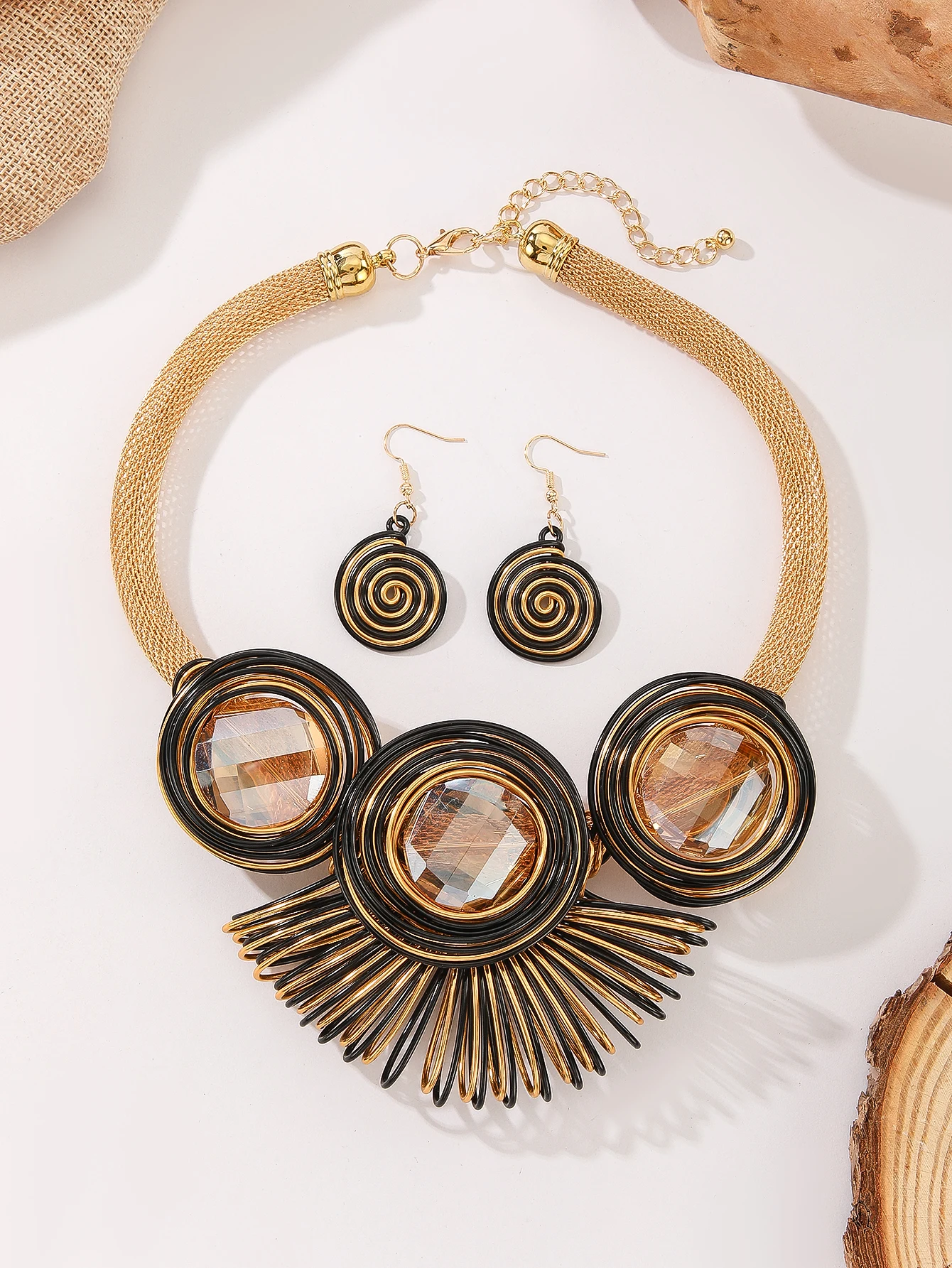 

A set of brown glass gemstone pendant clavicle necklace and earrings, fashionable sunflower statement jewelry