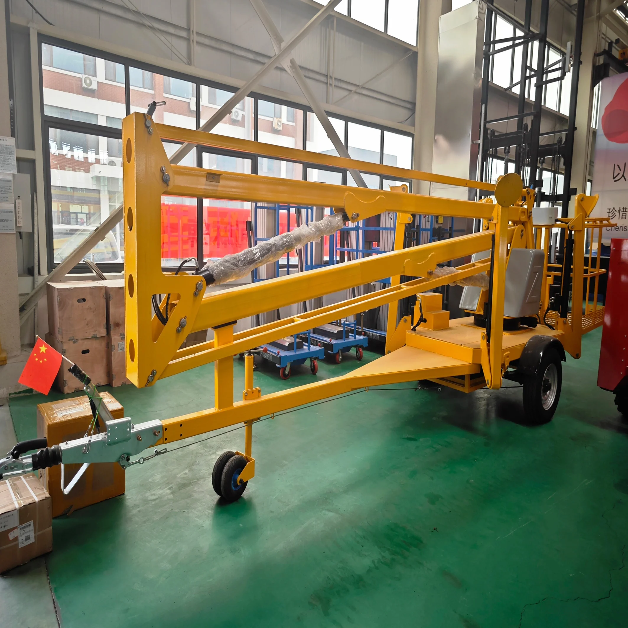 Ce Certificated 12m Electric Automatic Leveling Trailer Mounted Aerial Platform Basket Boom Lift