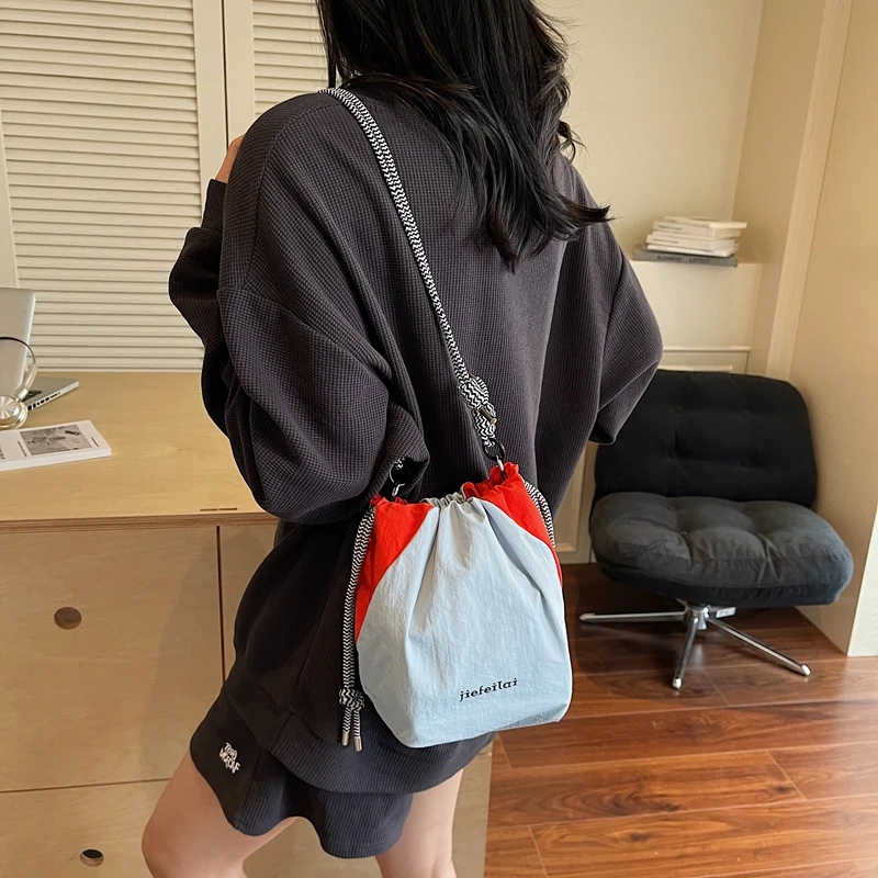 

Outdoor Nylon Buet Bag Crossbody Camera Bag Women's Light Woven Line Splicing Color Contrast New 2025 Spring Season