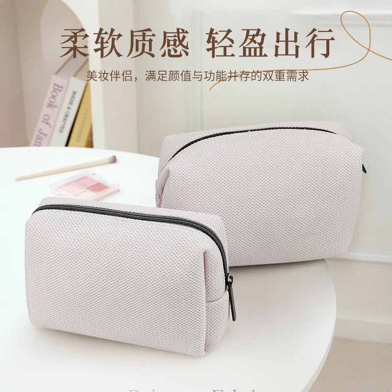 High-end, cute, portable, and soft space cotton hand-held makeup organizer bag