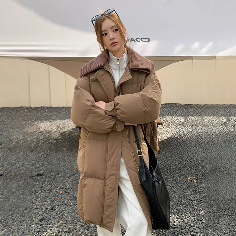 موضة التلبيب منتصف طول أسفل سترة قطن المرأة الشتاء يندبروف الدافئة زمم سترات 2025 الكورية الشارع الشهير معطف طويل مبطن