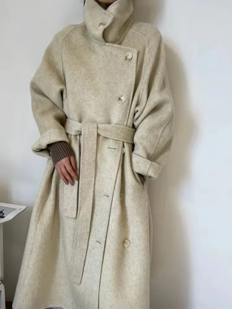 

Autumn and winter stand-up collar high-end loose and lazy thickened long-haired long big-name fan double-sided wool coat