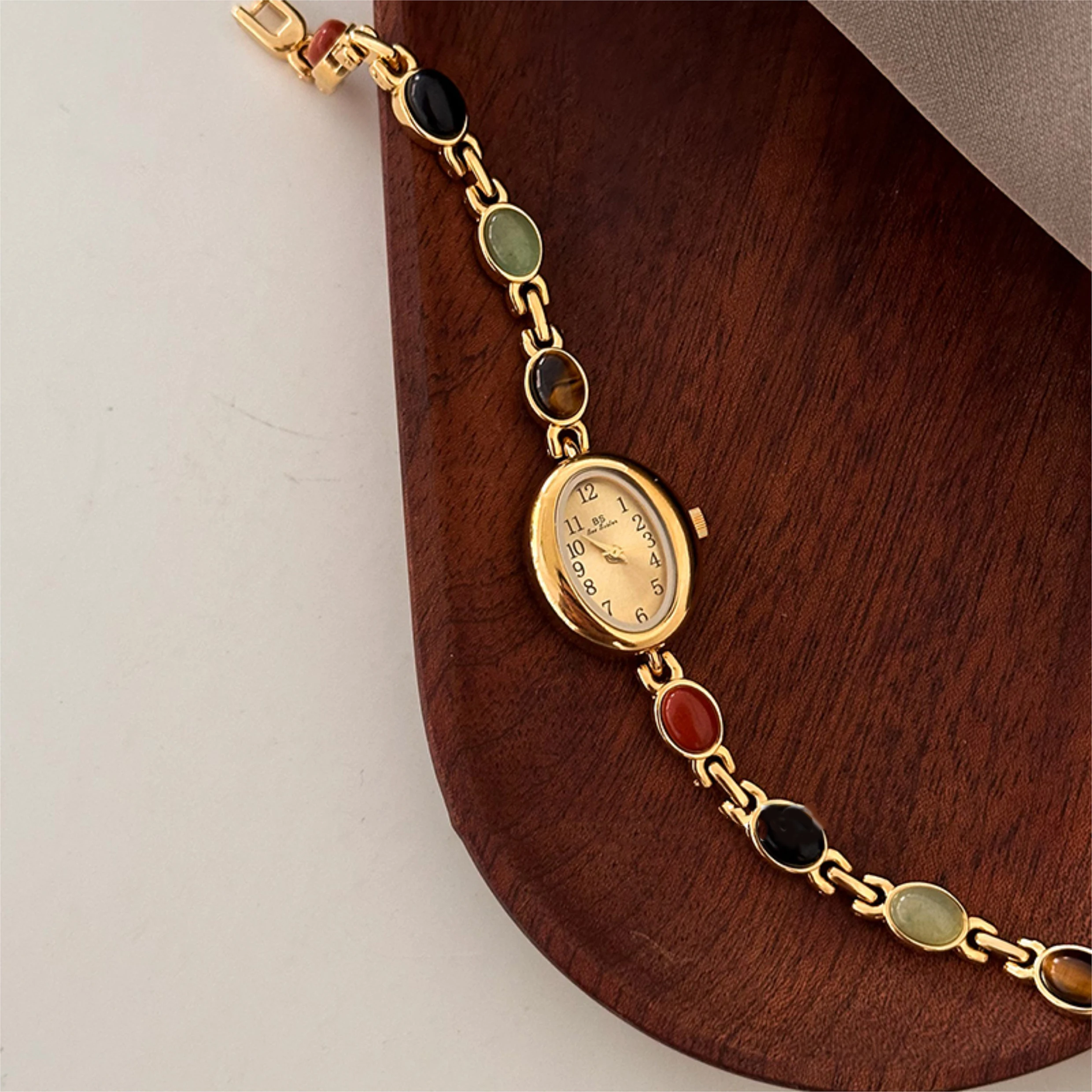 Relojes de lujo de alta gama para mujer, piedras preciosas de Esmeralda dorada, resistente al agua, ovalados, elegantes, de cuarzo, accesorios para mujer 2025