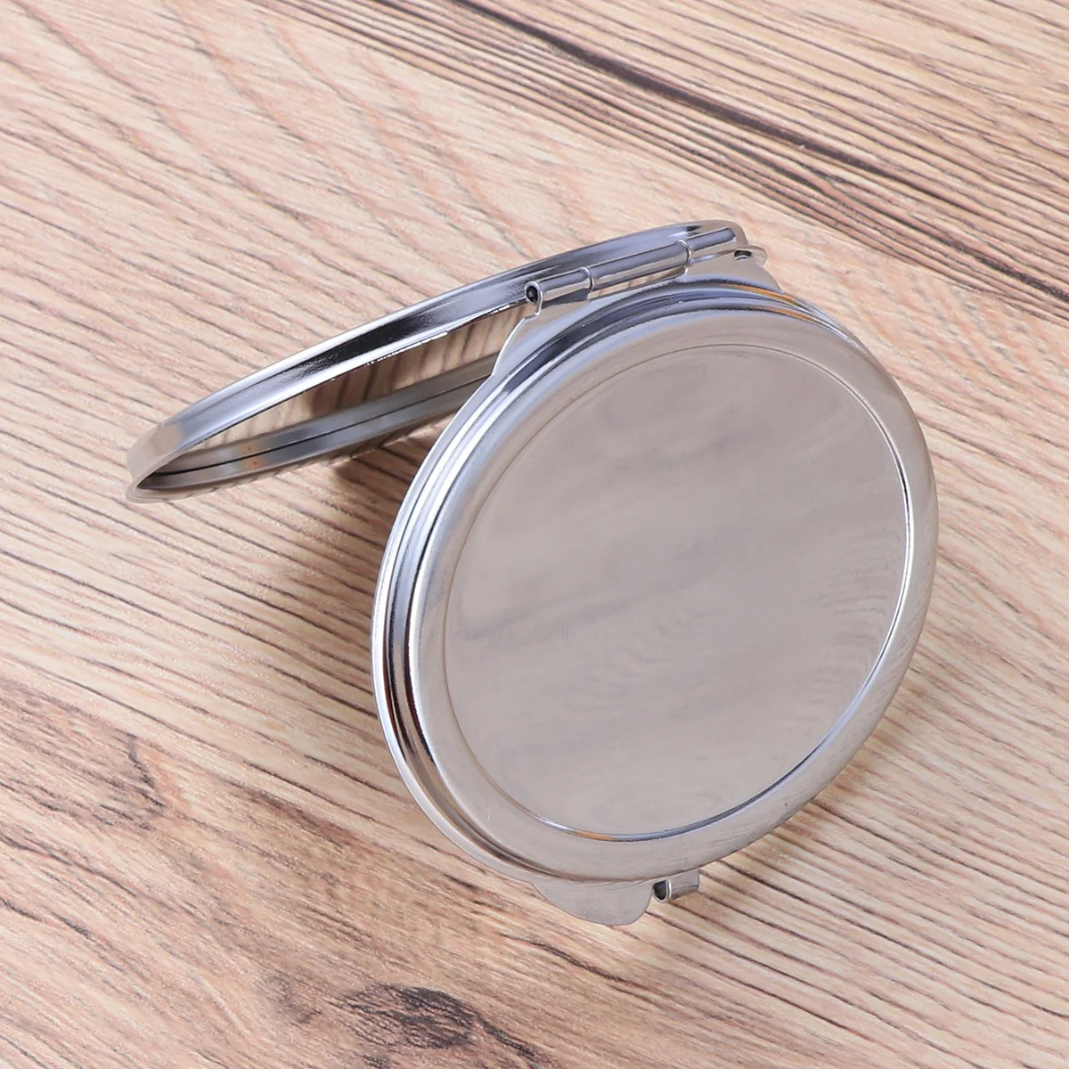 

Compact Oval Makeup Mirror Double Sided Foldable Design High Definition Reflective Surface Ideal for on The Go Use