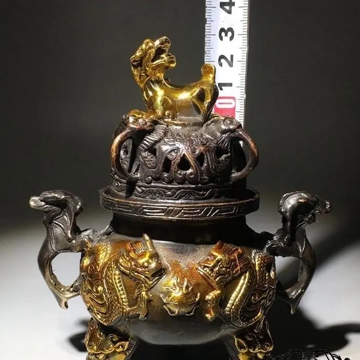 Daming Xuande pure copper gilt auspicious beast Pixiu three-legged Kowloon tripod incense burner ornament ancient copper incense
