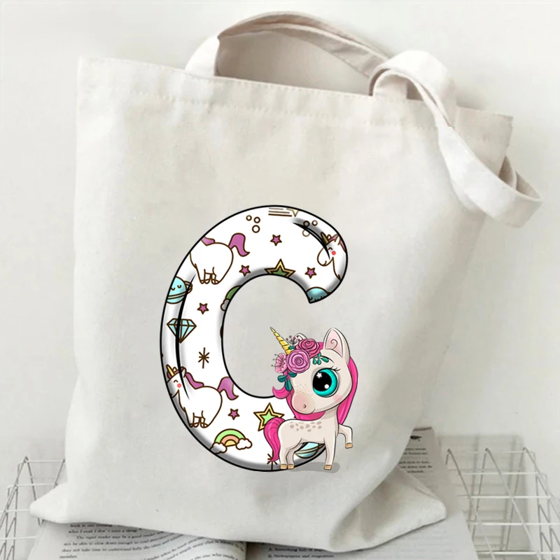 Woman’s Unicorn Alphabet White Print Tote Bag Harajuku Shopping Bags Unisex Cartoon Style Cute Unicorn Shopper Shoulder Bag