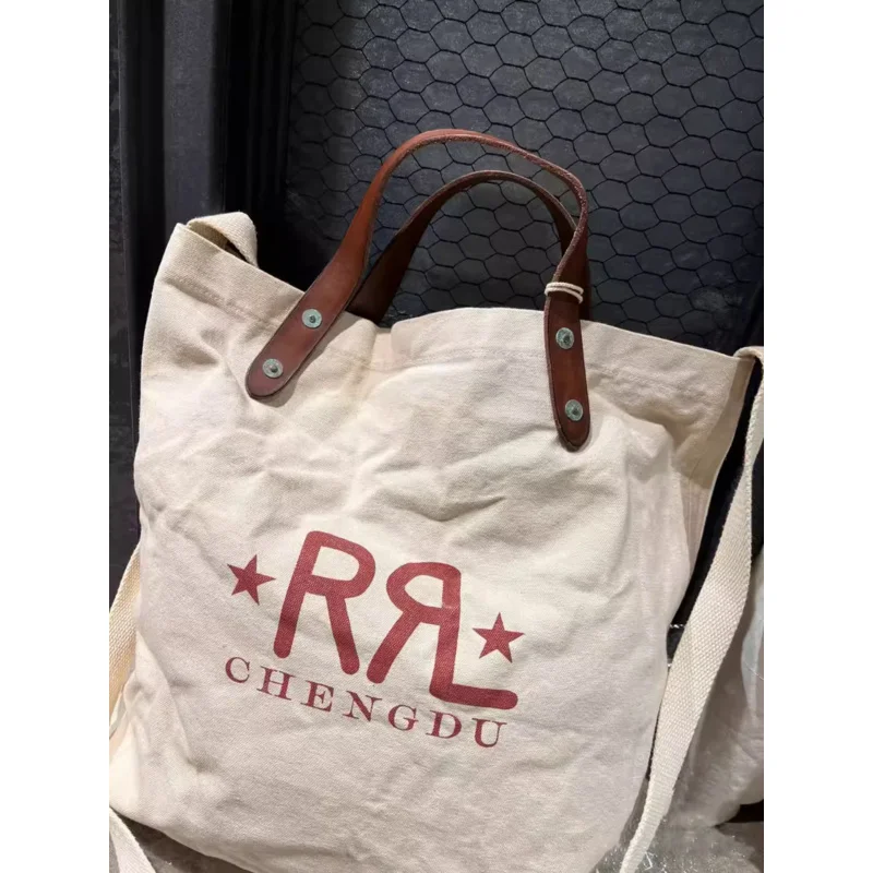 Rrl อเมริกาแบบย้อนยุค Chengdu กระเป๋าผ้าใบแบบจำกัดกระเป๋าสะพายหลังหนังแท้แบบดั้งเดิมกระเป๋าเอกสารแบบถือญี่ปุ่นแบบลำลอง