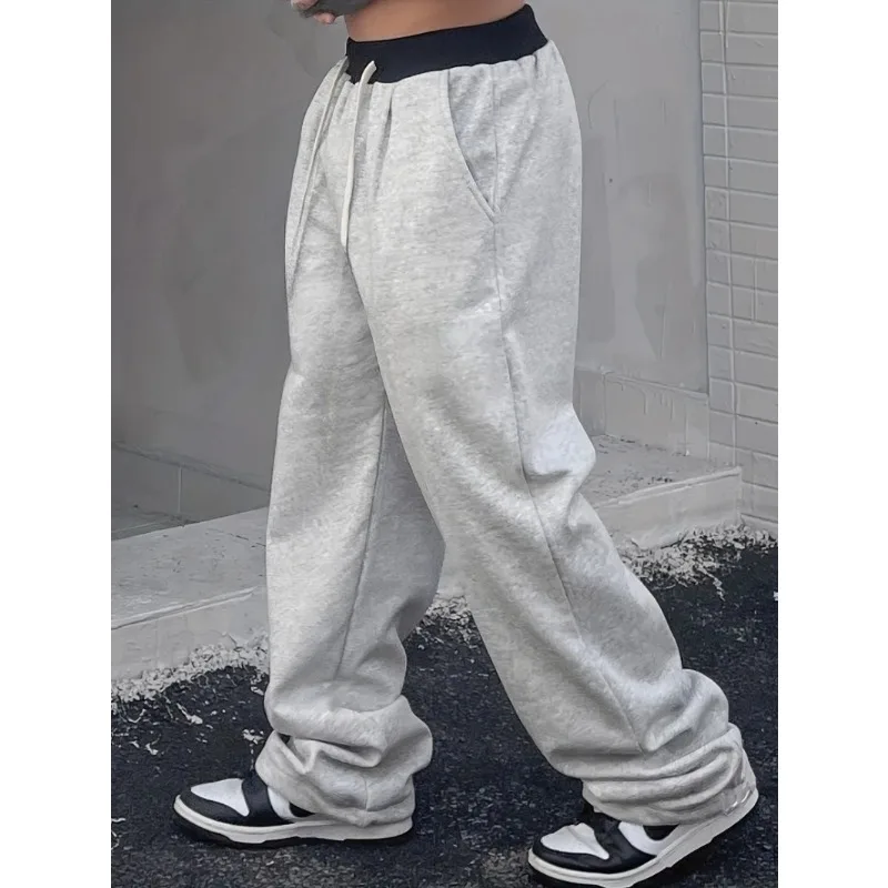 

Мужские повседневные спортивные штаны контрастного цвета — хлопковый материал, можно стирать в машине, однотонные с поясом на шнурке.