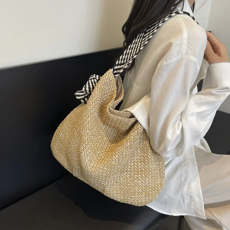 

Large capacity straw woven bag for women's summer 2024 new beach vacation woven bag lazy style one shoulder commuting tote bag