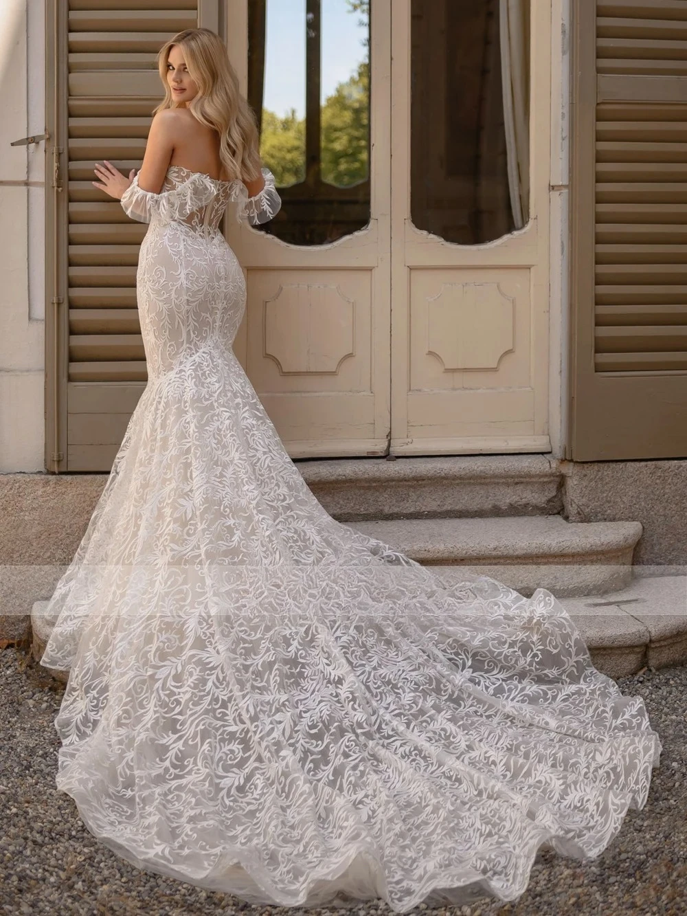 Customized Off Shoulder Curved V Fitted Silhouette Gown Ruffled Cuffs Floral Motif Structured Corset Torso Wavy Flared Hem Dress