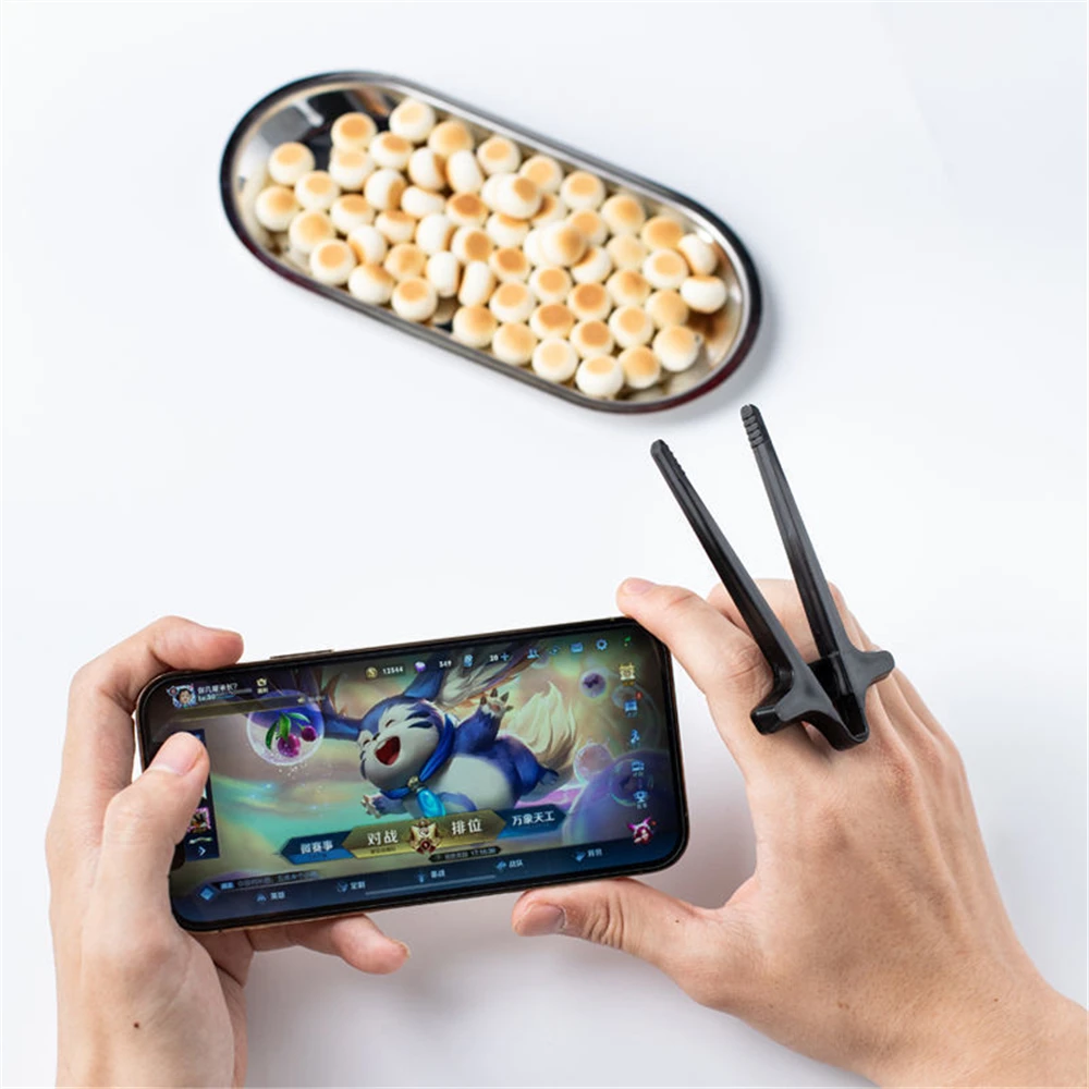 Accesorio asistente perezoso mano teléfono dedo palillos Clip bocadillos jugar juegos