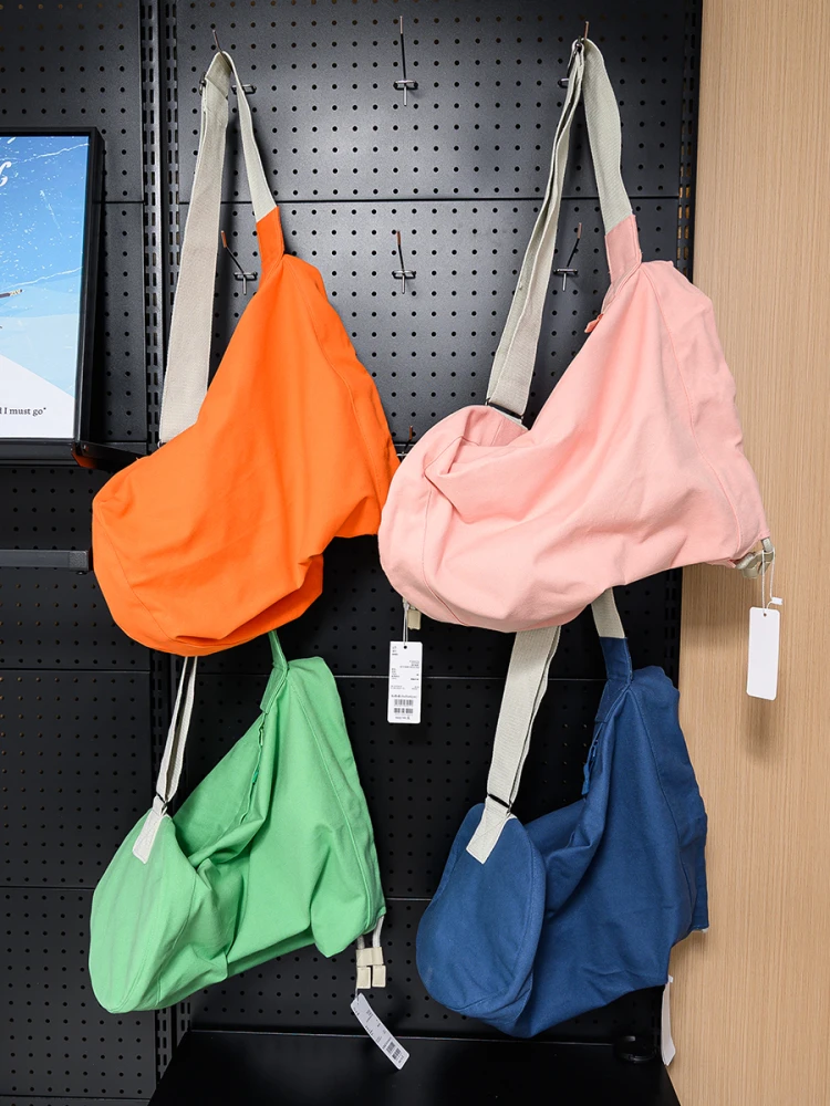 

Couples Outdoor Fashionable Drawstring Large Capacity Durable Canvas Shoulder Crossbody Bag Casual Simple Style for Youth