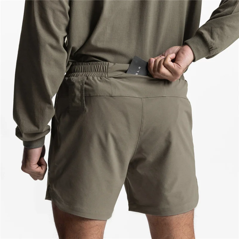 

2024 New Men's Running Quick Dry Fitness Gyms Shorts Mens Summer Short Pants Male Jogger Workout Beach pants Woven shorts men