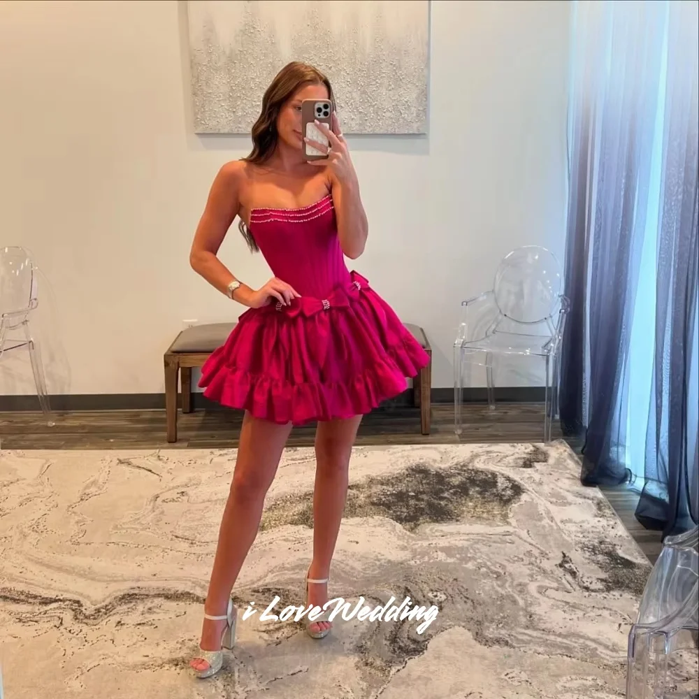 Rosa Perlen trägerloser Minirock Taft ärmellose Schleife Heimkehrkleider A-Linie plissiert modernes Geburtstagspartykleid individuell