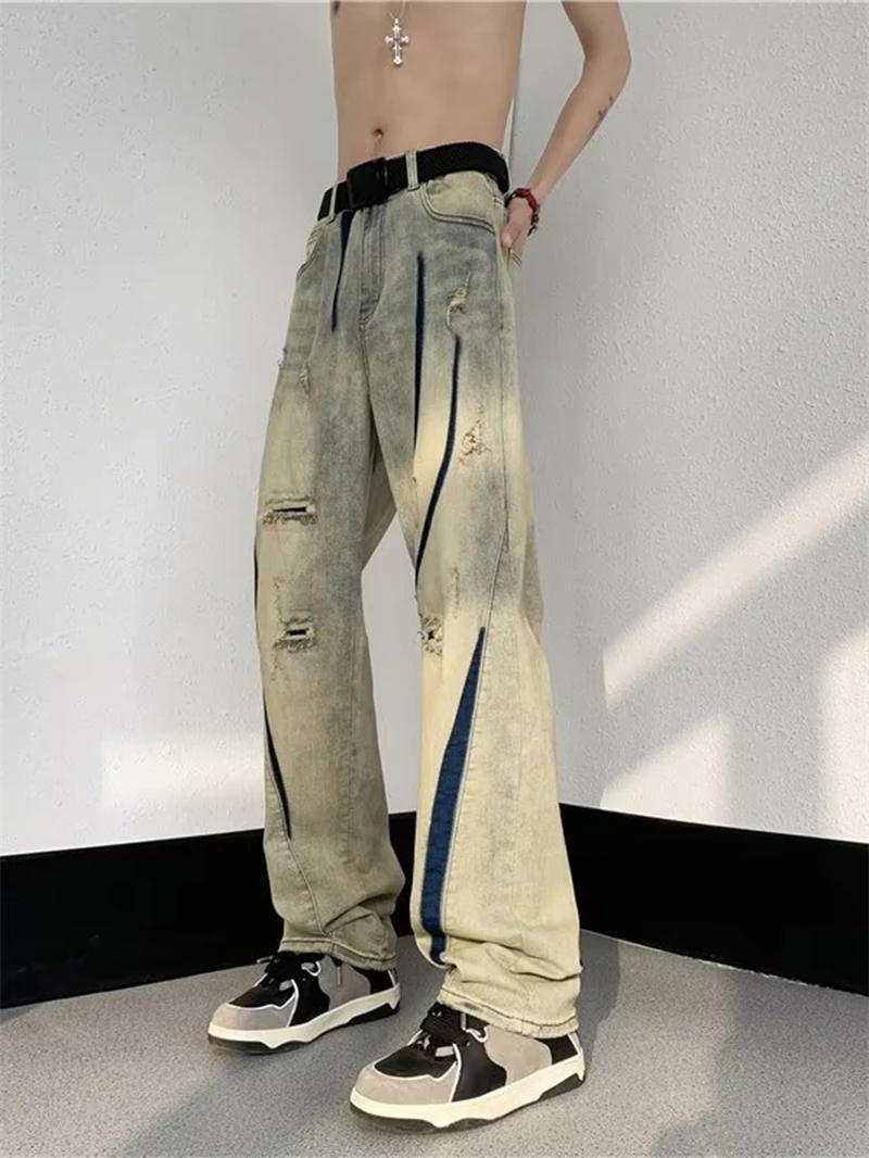 Calça Jeans Unissex Amarela Estilo Retrô Americano High Street com Efeito Rasgado, Lavagem Solta, Perna Larga e Reta, Primave...