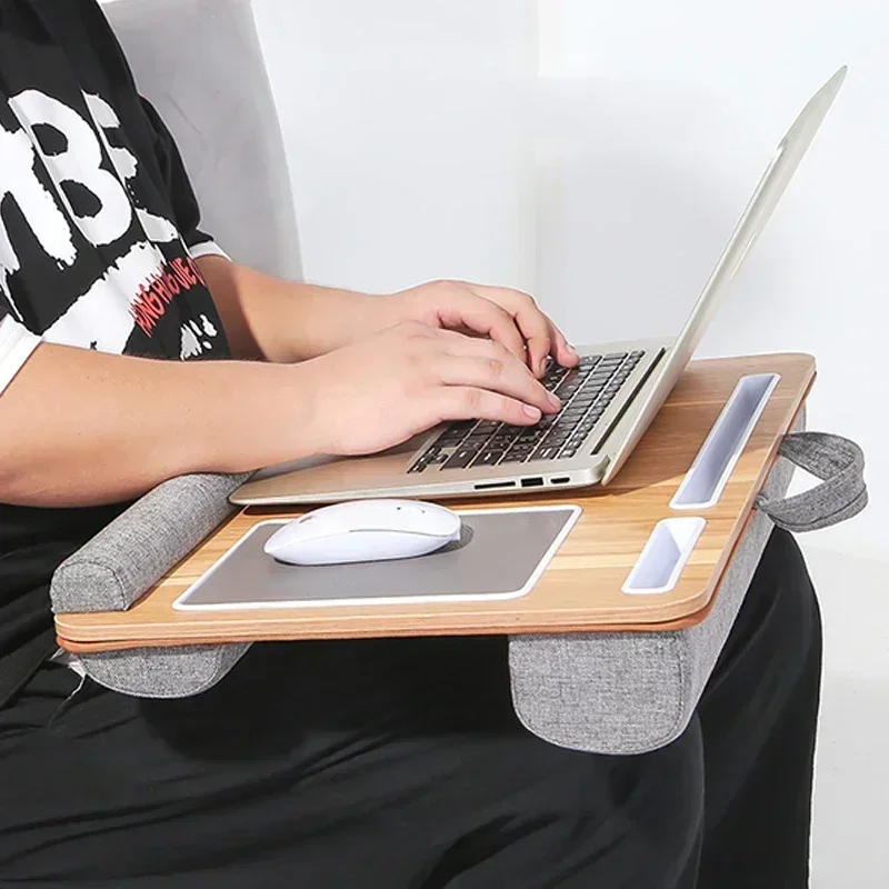 Portable lap desk/laptop stand for student dorms and bedrooms; compatible with laptops and tablets; features a device slot.