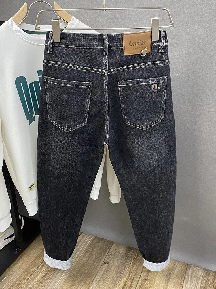 

2025 autumn new trend street small leg jeans men, simple and versatile, elastic tapered long pants
