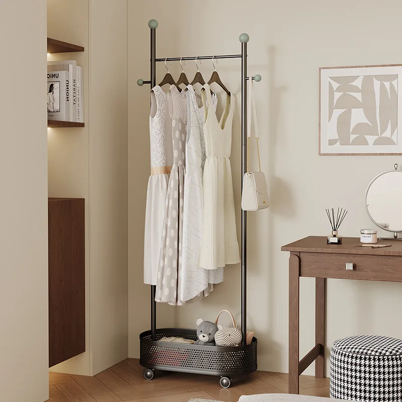 

Cream wind hanger floor to ceiling bedroom coat rack small household mobile laundry basket room