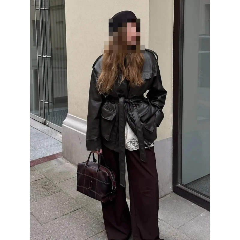 Korean version of niche versatile waist thin medium and long handsome locomotive leather jacket