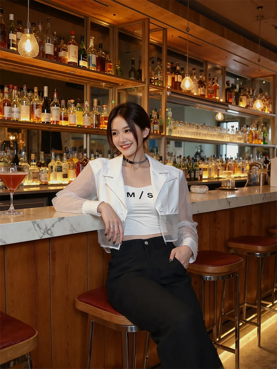 سترات شفافة شفافة مقاومة للشمس للنساء مع تصميمات ملابس نسائية شتوية على الطراز الكوري أنيقة واحدة الصدر OL