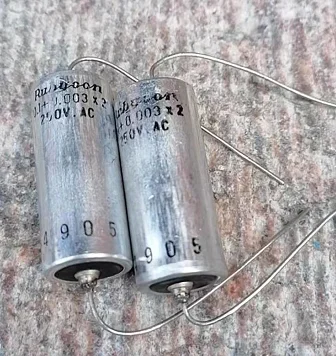 1pcs/1lot Axial electrolytic capacitor    axial 0.1UF 0.1+0.003*2 250VAC vacuum cleaner motor capacitor double outlet