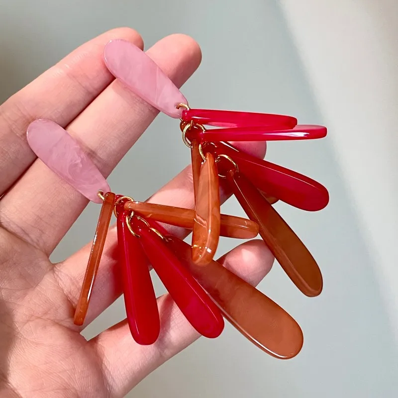Retro pink and orange color-blocked teardrop earrings with dopamine-enhancing colorful tassels