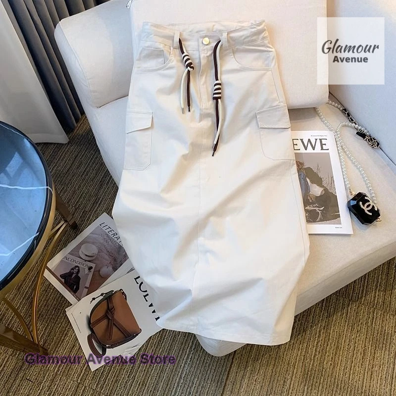 

Korean-style tooling skirt female summer new plus size fashion temperament high waist slim pocket split A word long skirt.