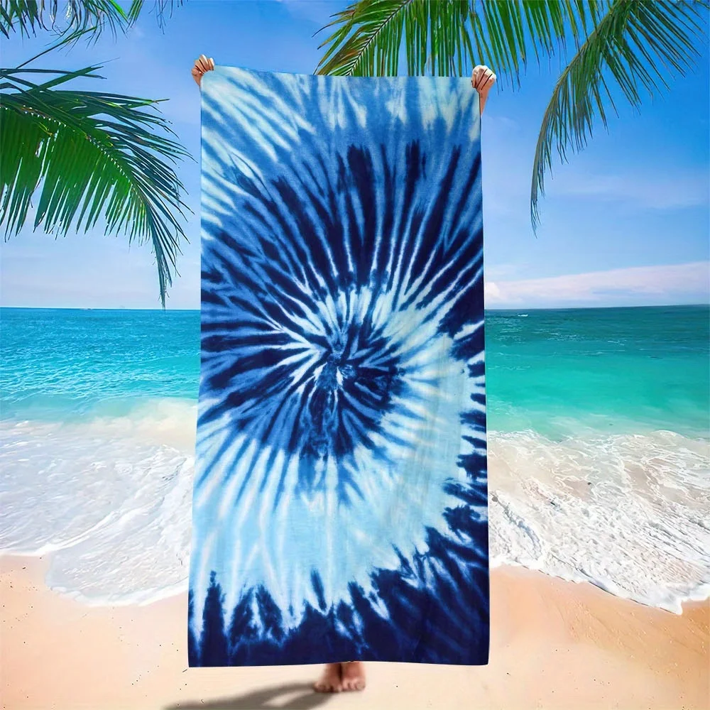 

One extra-large tie-dyed microfiber beach towel, highly absorbent, a must-have for summer travel.