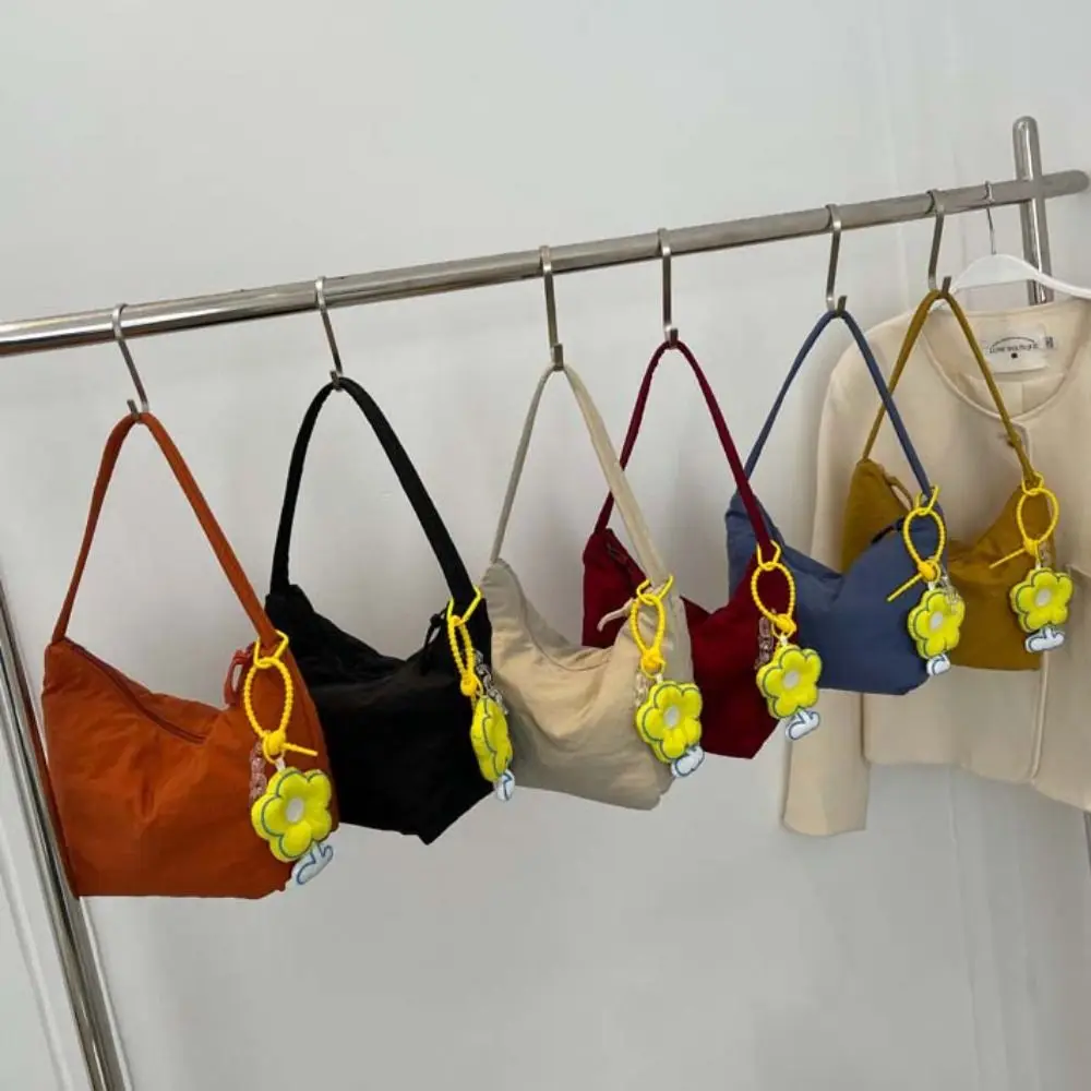 

Korean Style Solid Color Hand Bag with Flower Pendant Dumplings Bag Light Soft Nylon Bag Zipper Large Capacity Shoulder Bag