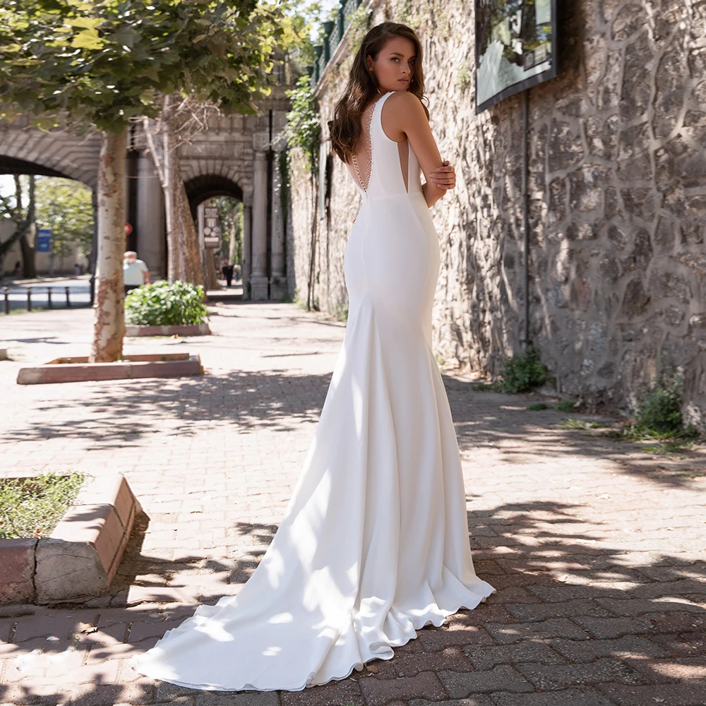 Semplice abito da sposa a sirena Sexy scollo a V senza maniche perline lungo treno in Chiffon Backless abito da sposa abiti da sposa