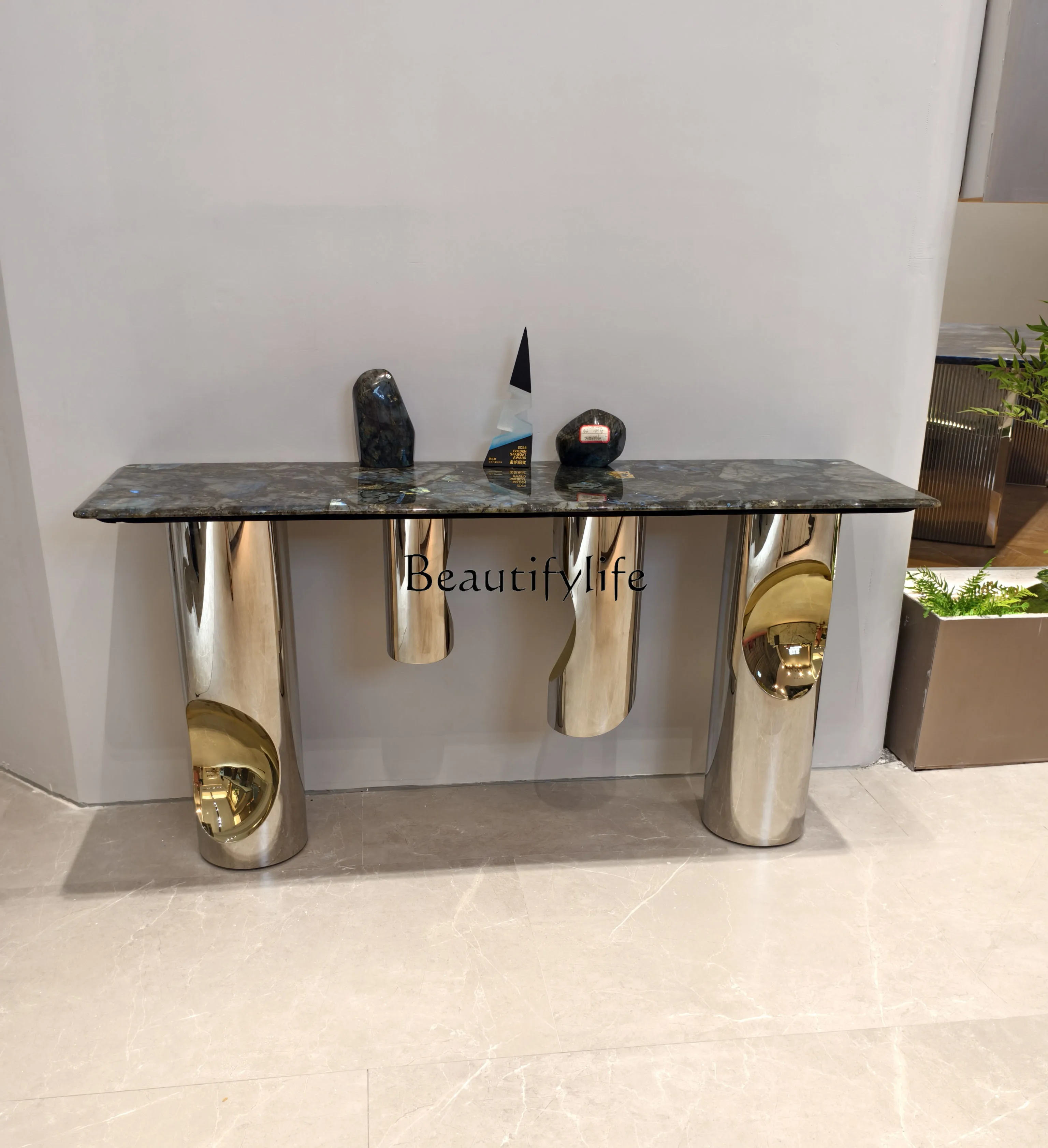 

Italian light luxury entrance table against the wall stainless steel entrance metal table