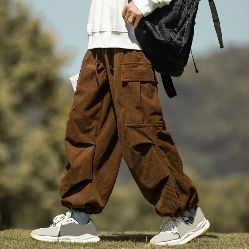 Pantaloni da uomo con coulisse pantaloni Cargo in velluto a coste stile Vintage con Multi tasche per uomo Streetwear gamba dritta vestibilità ampia per esterno