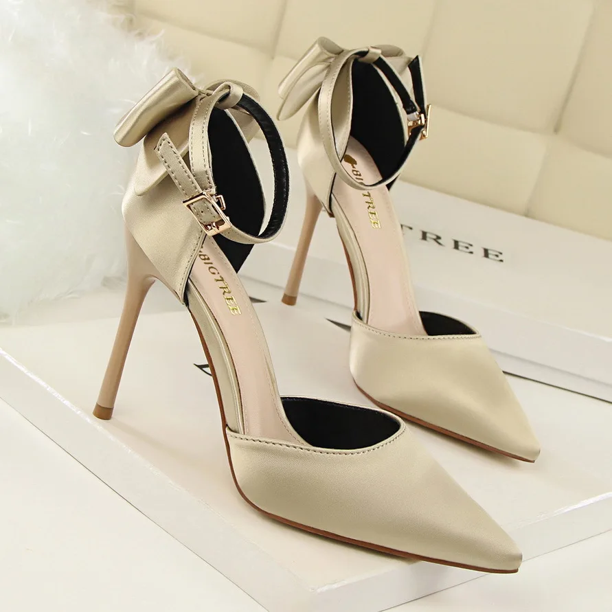 

Korean Version Thin Heel High Heel Shallow Mouth Pointed Head Hollow Back Bow Word with Women's Sandals