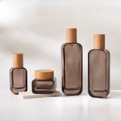 1pc Essence Lotion Bottle Travel Press Pump Bottle Glass Clear Empty Cosmetic Containers Essential Refillable Bottles Cream Jar