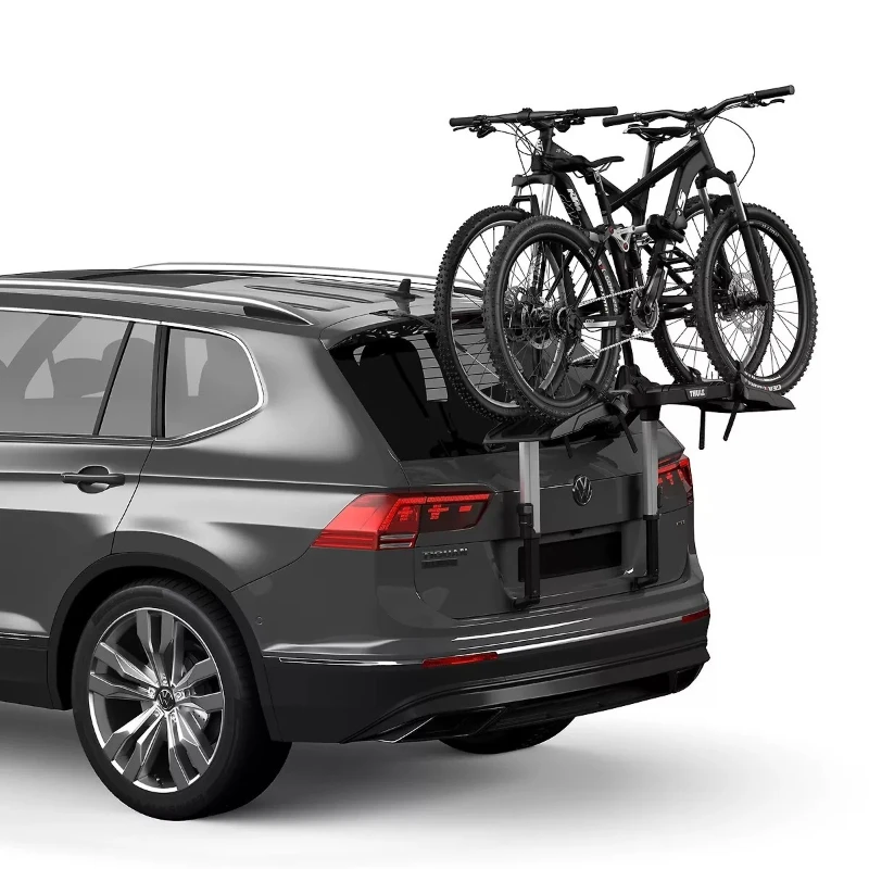 Suspended trunk bike rack can hold 3/2 bicycles