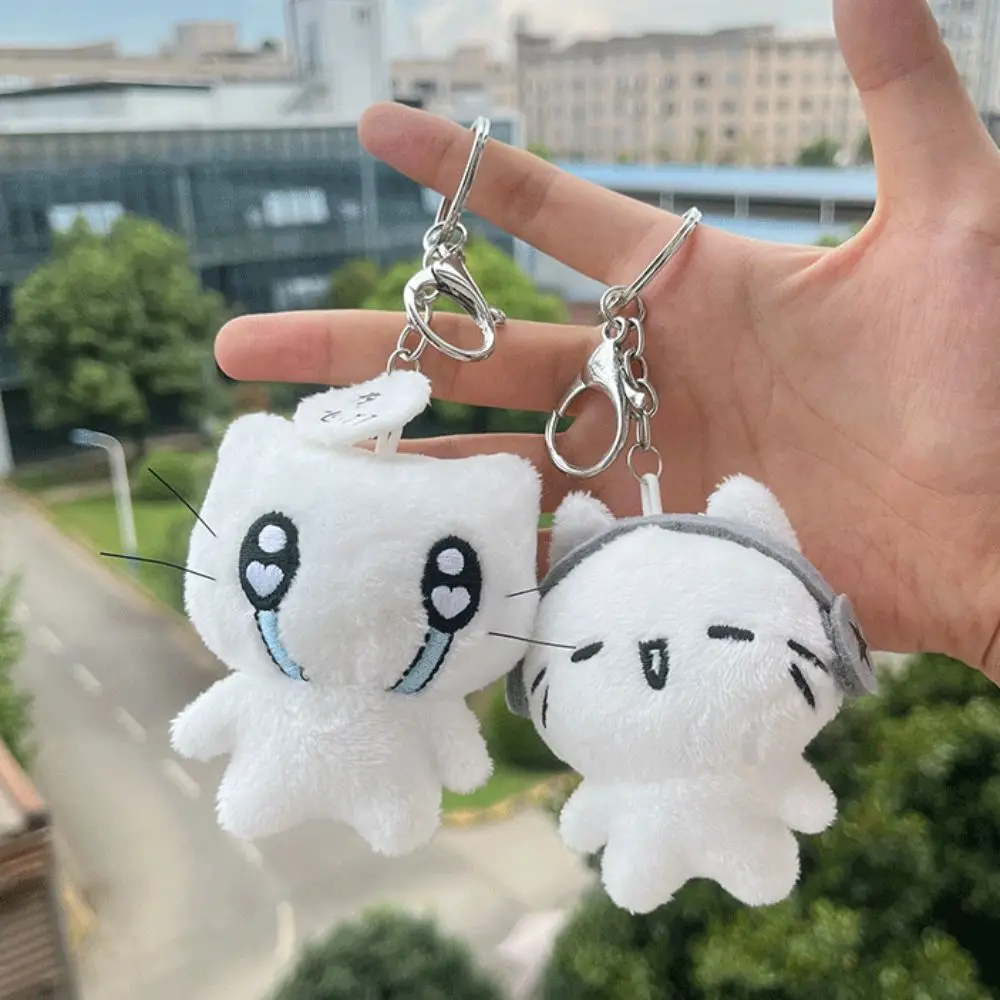 

PP Cotton Earphones Cat Plush Pendant Simulated Upset Sad Cat Doll Keychain Happy Cartoon Cross Dressing Animal Key Ring Kids