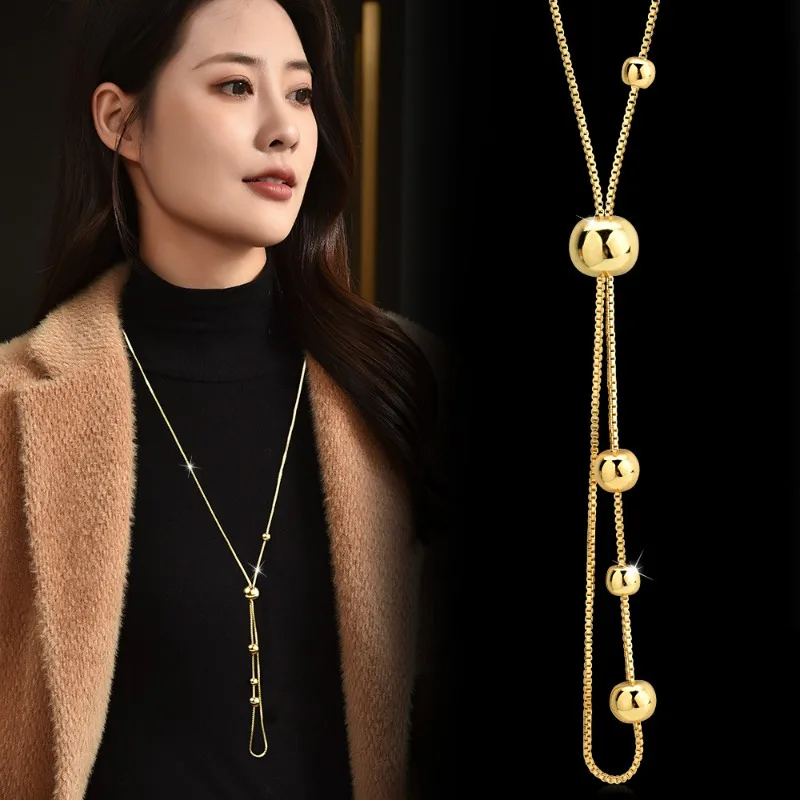 القلادة الطويلة القابلة للسحب من الفولاذ التيتانيوم هي نمط جديد للنساء في الخريف والشتاء، قلادة عصرية ومتعددة الاستخدامات