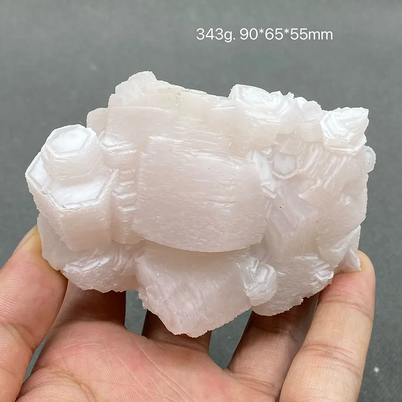 Calcite di colore rosa naturale al 100% con pietra di cristallo curativa per campioni grezzi effetto fluorescente