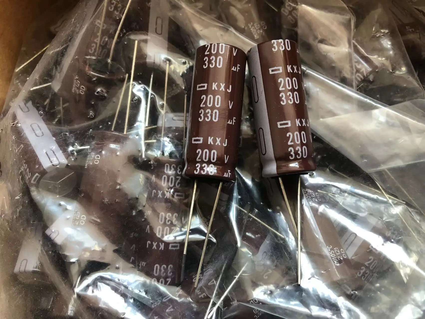 مكثف كهروليتي نيبون ، KXJ ، من من من من من من من من من من من من من ، من من من من ، من من ، من ، من ، من ، من ، من ، من ، من #1