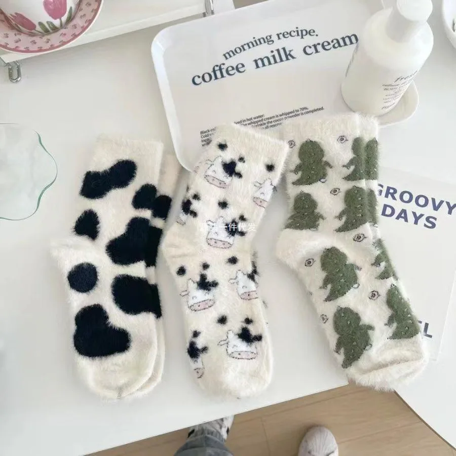5 pairs of women’s autumn and winter mid-calf socks featuring cute animals and cloud patterns. Perfect for cozy winter days